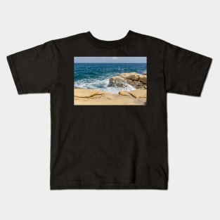 Wave breaks on rocks of the Sliema coast Kids T-Shirt